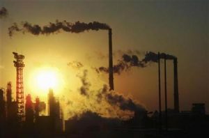 Smoke billows from chimneys at a chemical factory in Tianjin Municipality in this December 23, 2008 file photo. REUTERS/Stringer